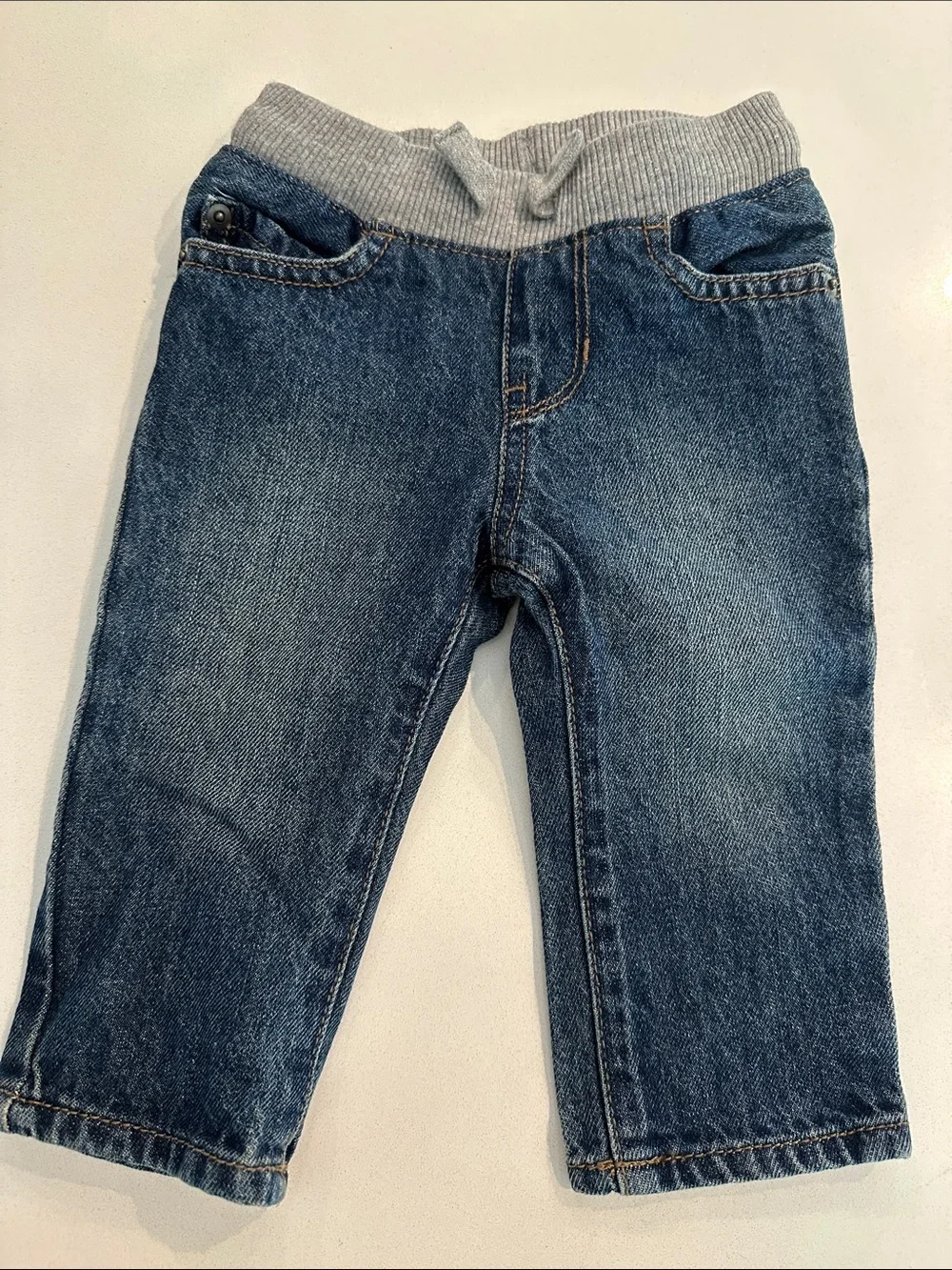 The Children's Place Blue Denim Pull-On Jeans w/ Gray drawstring Waistband. 6-9M